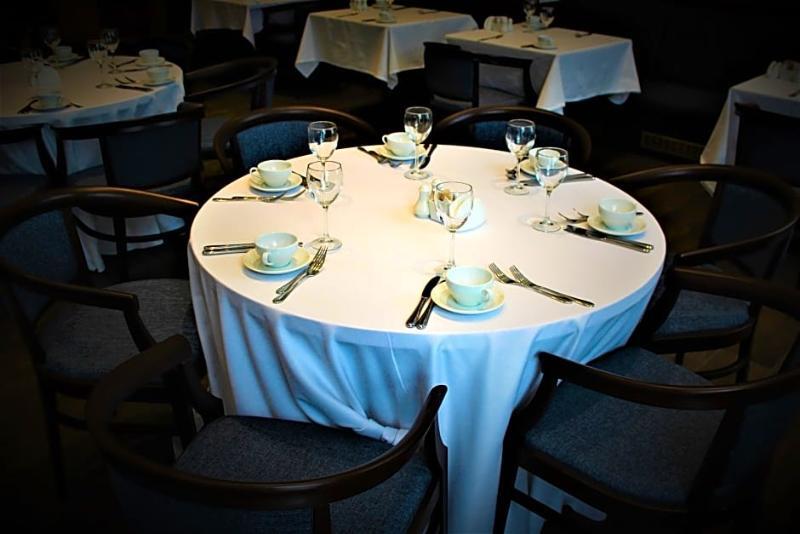 Rahat Palace Hotel Almatý Exterior foto A table set for a meal